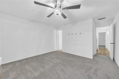 Adorable B-Plan corner unit-the largest model in the on The American Golf Club in Florida - for sale on GolfHomes.com, golf home, golf lot