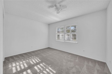 Adorable B-Plan corner unit-the largest model in the on The American Golf Club in Florida - for sale on GolfHomes.com, golf home, golf lot