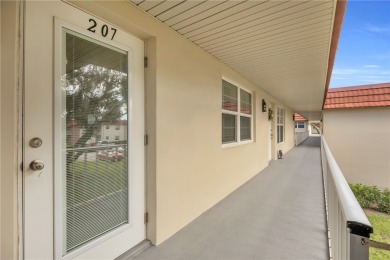 Adorable B-Plan corner unit-the largest model in the on The American Golf Club in Florida - for sale on GolfHomes.com, golf home, golf lot