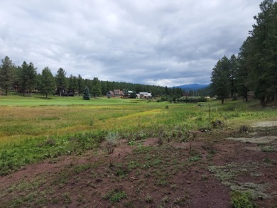 A half-acre lot on the 8th green! This is a prime lot near the on Angel Fire Resort Country Club in New Mexico - for sale on GolfHomes.com, golf home, golf lot