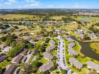Under contract-accepting backup offers. FOR SALE - 2 Bedroom/2 on Cypresswood Golf and Country Club in Florida - for sale on GolfHomes.com, golf home, golf lot