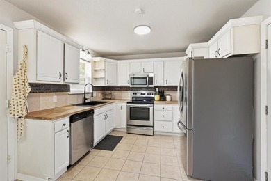 This adorable home in North Richland Hills is the perfect size on Diamond Oaks Golf and Country Club in Texas - for sale on GolfHomes.com, golf home, golf lot