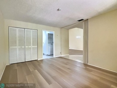 ALL ASSESMENTS PAID. SELLER CONCESSION TOWARD BUYER'S CLOSING on Woodmont Country Club in Florida - for sale on GolfHomes.com, golf home, golf lot