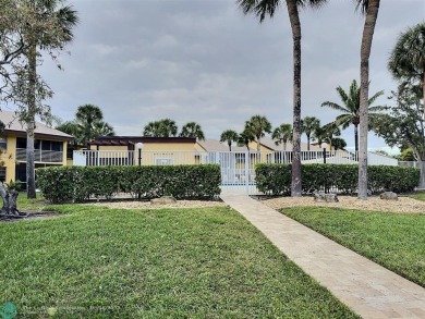 ALL ASSESMENTS PAID. SELLER CONCESSION TOWARD BUYER'S CLOSING on Woodmont Country Club in Florida - for sale on GolfHomes.com, golf home, golf lot