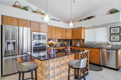 CUSTOM DESIGNED BY DON TRAURIG . . . FAIRWAY VIEWS OF 5TH HOLE on University Park Country Club in Florida - for sale on GolfHomes.com, golf home, golf lot