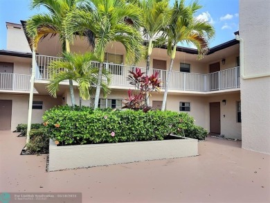 ALL ASSESMENTS PAID. SELLER CONCESSION TOWARD BUYER'S CLOSING on Woodmont Country Club in Florida - for sale on GolfHomes.com, golf home, golf lot