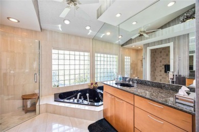CUSTOM DESIGNED BY DON TRAURIG . . . FAIRWAY VIEWS OF 5TH HOLE on University Park Country Club in Florida - for sale on GolfHomes.com, golf home, golf lot