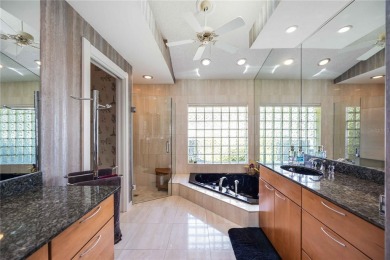 CUSTOM DESIGNED BY DON TRAURIG . . . FAIRWAY VIEWS OF 5TH HOLE on University Park Country Club in Florida - for sale on GolfHomes.com, golf home, golf lot