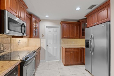 ABSOLUTELY GORGEOUS TOWNHOUSE | PRESTIGIOUS BOCA POINTE | QUICK on Boca Pointe Country Club in Florida - for sale on GolfHomes.com, golf home, golf lot