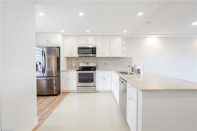 Cozy and modern 2-bedroom, 2-bathroom apartment with a carport on The Glades Golf and Country Club in Florida - for sale on GolfHomes.com, golf home, golf lot