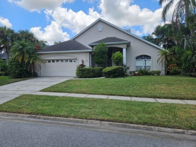 The home was custom designed. Located in the Oaks Golf Community on Oaks National Golf Course in Florida - for sale on GolfHomes.com, golf home, golf lot