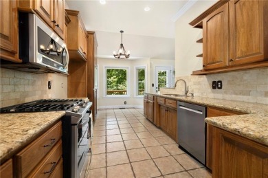 Tucked away in the cul-de-sac and spanning 2 lots, this stunning on Bella Vista - Metfield Golf Complex and Country Club in Arkansas - for sale on GolfHomes.com, golf home, golf lot