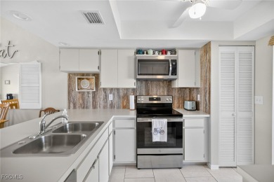Discover easy living in this charming 2-bedroom, 2-bath condo on Riverbend Golf and Country Club in Florida - for sale on GolfHomes.com, golf home, golf lot