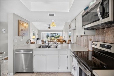 Discover easy living in this charming 2-bedroom, 2-bath condo on Riverbend Golf and Country Club in Florida - for sale on GolfHomes.com, golf home, golf lot