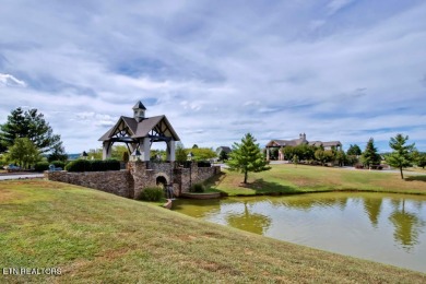 Introducing a picturesque one-level building site nestled within on Rarity Bay Country Club - Loudon in Tennessee - for sale on GolfHomes.com, golf home, golf lot