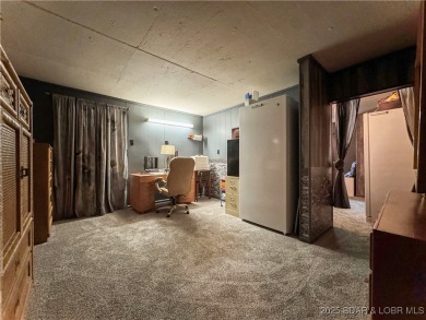 Located down the highly desirable *O* Road in Laurie, this on Indian Rock Golf Club in Missouri - for sale on GolfHomes.com, golf home, golf lot