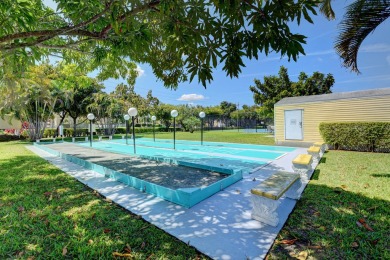 Welcome to this meticulously maintained 2-bed, 2-bath this on Boca Dunes Golf and Country Club in Florida - for sale on GolfHomes.com, golf home, golf lot