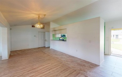 Featuring a rare 3 CAR GARAGE, this newer construction 3-bedroom on Oyster Creek Golf Club in Florida - for sale on GolfHomes.com, golf home, golf lot