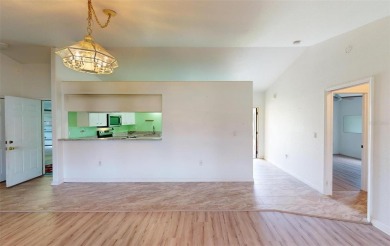 Featuring a rare 3 CAR GARAGE, this newer construction 3-bedroom on Oyster Creek Golf Club in Florida - for sale on GolfHomes.com, golf home, golf lot