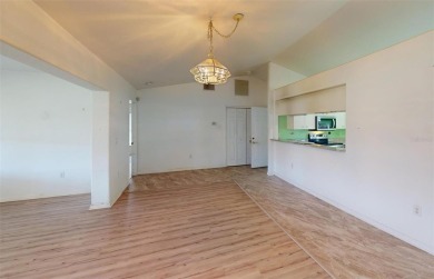 Featuring a rare 3 CAR GARAGE, this newer construction 3-bedroom on Oyster Creek Golf Club in Florida - for sale on GolfHomes.com, golf home, golf lot