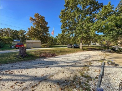 Located down the highly desirable *O* Road in Laurie, this on Indian Rock Golf Club in Missouri - for sale on GolfHomes.com, golf home, golf lot