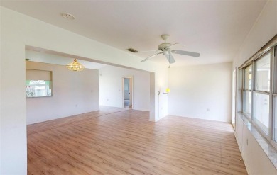 Featuring a rare 3 CAR GARAGE, this newer construction 3-bedroom on Oyster Creek Golf Club in Florida - for sale on GolfHomes.com, golf home, golf lot