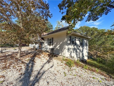 Located down the highly desirable *O* Road in Laurie, this on Indian Rock Golf Club in Missouri - for sale on GolfHomes.com, golf home, golf lot