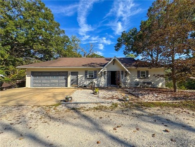 Located down the highly desirable *O* Road in Laurie, this on Indian Rock Golf Club in Missouri - for sale on GolfHomes.com, golf home, golf lot