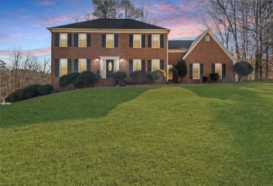 Welcome to 5659 Brookstone Drive a stunning 2-story Traditional on Brookstone Golf and Country Club in Georgia - for sale on GolfHomes.com, golf home, golf lot