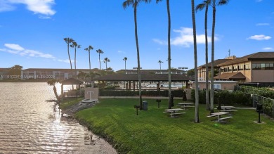 Experience vibrant 55+ living in this charming second floor on Flamingo Lakes Country Club in Florida - for sale on GolfHomes.com, golf home, golf lot