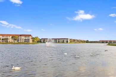 Experience vibrant 55+ living in this charming second floor on Flamingo Lakes Country Club in Florida - for sale on GolfHomes.com, golf home, golf lot