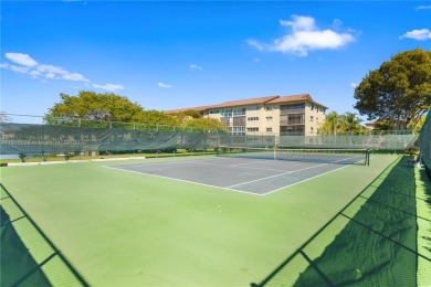 Experience vibrant 55+ living in this charming second floor on Flamingo Lakes Country Club in Florida - for sale on GolfHomes.com, golf home, golf lot