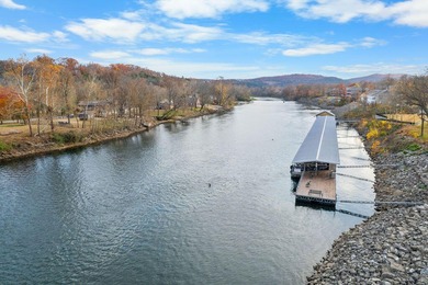 Wow - what a view!  This wonderful LAKEFRONT condo comes FULLY on Pointe Royale Village Country Club in Missouri - for sale on GolfHomes.com, golf home, golf lot