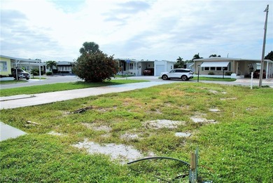 Rare oversized corner lot with golf course views overlooking the on Six Lakes Country Club in Florida - for sale on GolfHomes.com, golf home, golf lot