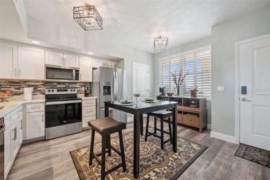 Welcome to this beautifully updated 2-bedroom, 2-bathroom condo on East Bay Golf Club in Florida - for sale on GolfHomes.com, golf home, golf lot