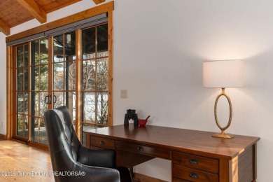 This well-designed Lupine model features an open-concept kitchen on Teton Springs Resort and Club in Idaho - for sale on GolfHomes.com, golf home, golf lot