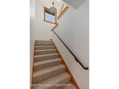 This well-designed Lupine model features an open-concept kitchen on Teton Springs Resort and Club in Idaho - for sale on GolfHomes.com, golf home, golf lot
