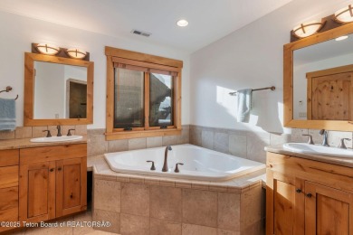 This well-designed Lupine model features an open-concept kitchen on Teton Springs Resort and Club in Idaho - for sale on GolfHomes.com, golf home, golf lot