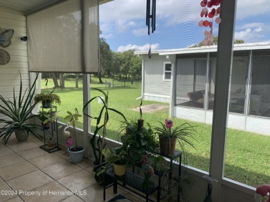 HOT TUB on large rear patio on the GOLF COURSE Located on a on High Point Golf Club, Inc. in Florida - for sale on GolfHomes.com, golf home, golf lot