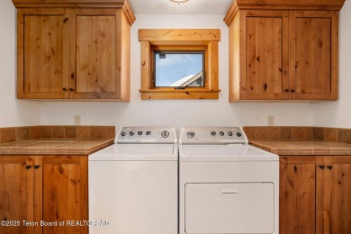 This well-designed Lupine model features an open-concept kitchen on Teton Springs Resort and Club in Idaho - for sale on GolfHomes.com, golf home, golf lot