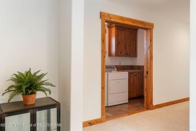 This well-designed Lupine model features an open-concept kitchen on Teton Springs Resort and Club in Idaho - for sale on GolfHomes.com, golf home, golf lot