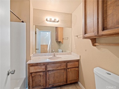 3-bedroom 2.5-bathroom, 1206sf nestled next to the North Lake on Silver Lakes Golf Course in California - for sale on GolfHomes.com, golf home, golf lot