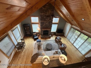 This well-designed Lupine model features an open-concept kitchen on Teton Springs Resort and Club in Idaho - for sale on GolfHomes.com, golf home, golf lot