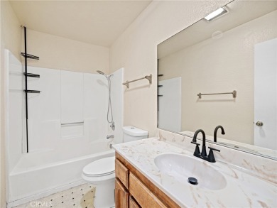 3-bedroom 2.5-bathroom, 1206sf nestled next to the North Lake on Silver Lakes Golf Course in California - for sale on GolfHomes.com, golf home, golf lot