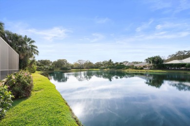 This stunning 3-bedroom, 3.5-bath home is nestled within an on The Loxahatchee Club in Florida - for sale on GolfHomes.com, golf home, golf lot