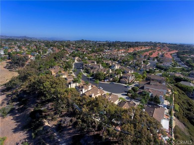 Located on a quiet cul-de-sac within the prestigious 24-hour on Monarch Beach Golf Links in California - for sale on GolfHomes.com, golf home, golf lot