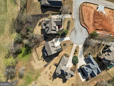 Welcome to 2046 Mill Pond Court in Jefferson, where luxury on Traditions of Braselton Golf Club in Georgia - for sale on GolfHomes.com, golf home, golf lot