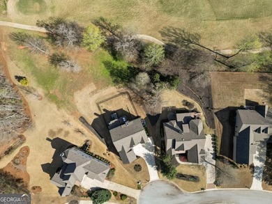 Welcome to 2046 Mill Pond Court in Jefferson, where luxury on Traditions of Braselton Golf Club in Georgia - for sale on GolfHomes.com, golf home, golf lot