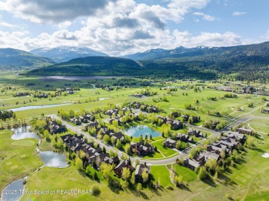 This well-designed Lupine model features an open-concept kitchen on Teton Springs Resort and Club in Idaho - for sale on GolfHomes.com, golf home, golf lot