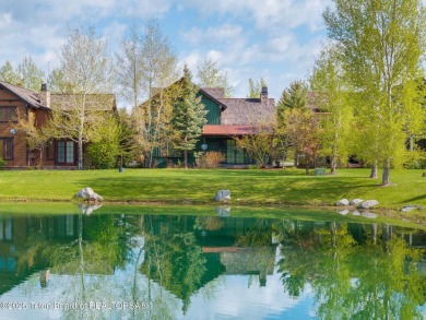 This well-designed Lupine model features an open-concept kitchen on Teton Springs Resort and Club in Idaho - for sale on GolfHomes.com, golf home, golf lot